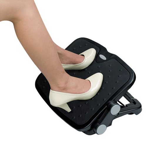 Woman showcasing an ergonomic footrest